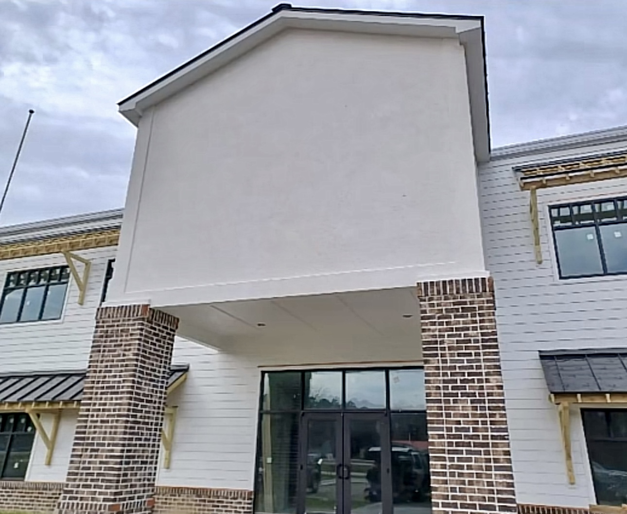 Stucco finish on building entry facade